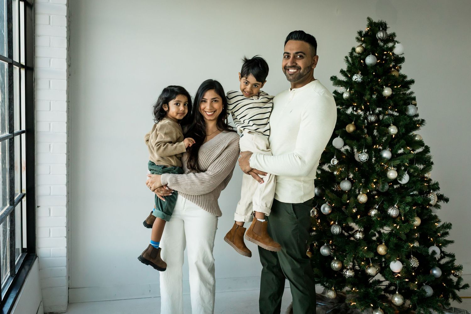 Indoor Christmas mini session in Calgary 2025 by Love & Sunshine Photography.
