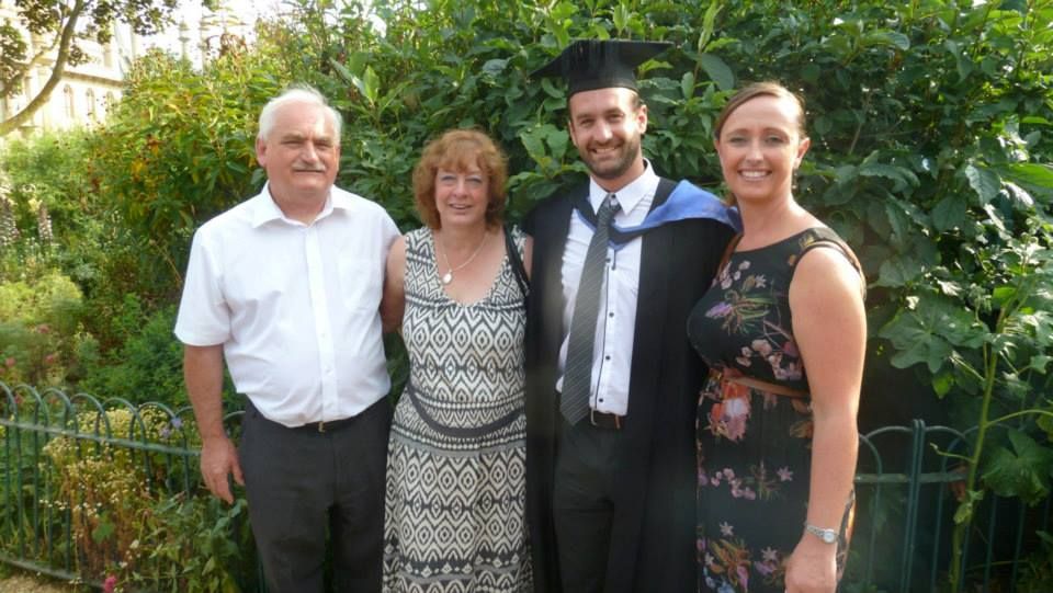 Russ Stedman graduating from University of Brighton with family