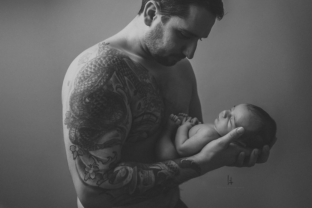 A series of intimate black and white photographs showing tender moments between parent and newborn baby.