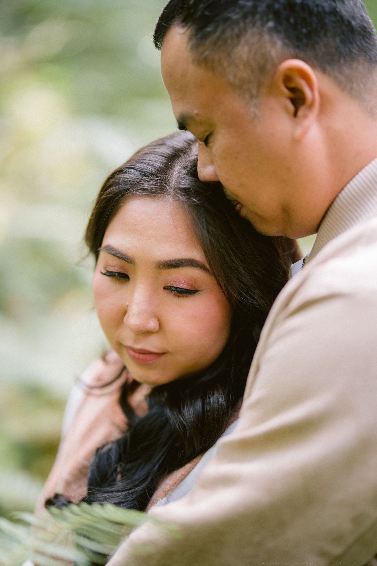 A romantic close-up series of tender moments between a couple in soft natural lighting.