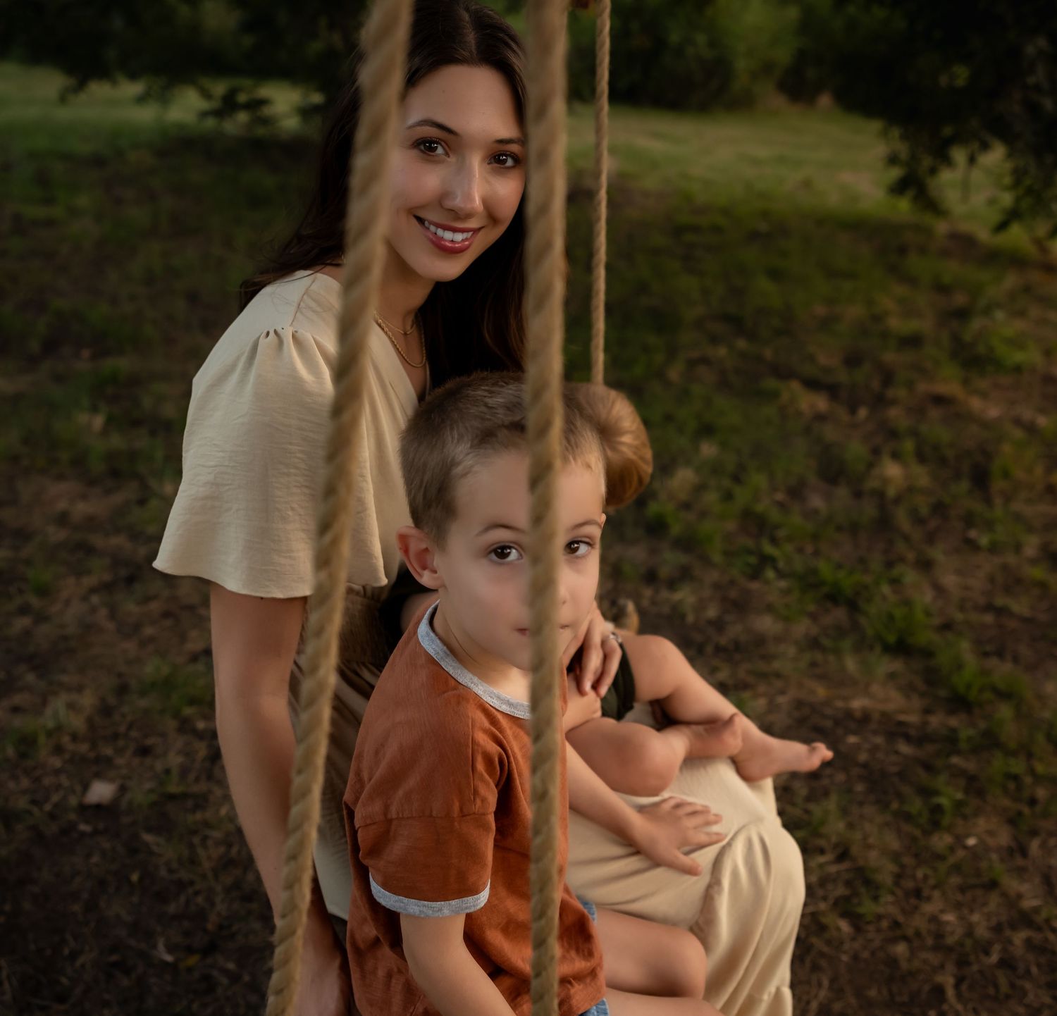 Family enjoying time together outdoors on a warm summer evening.