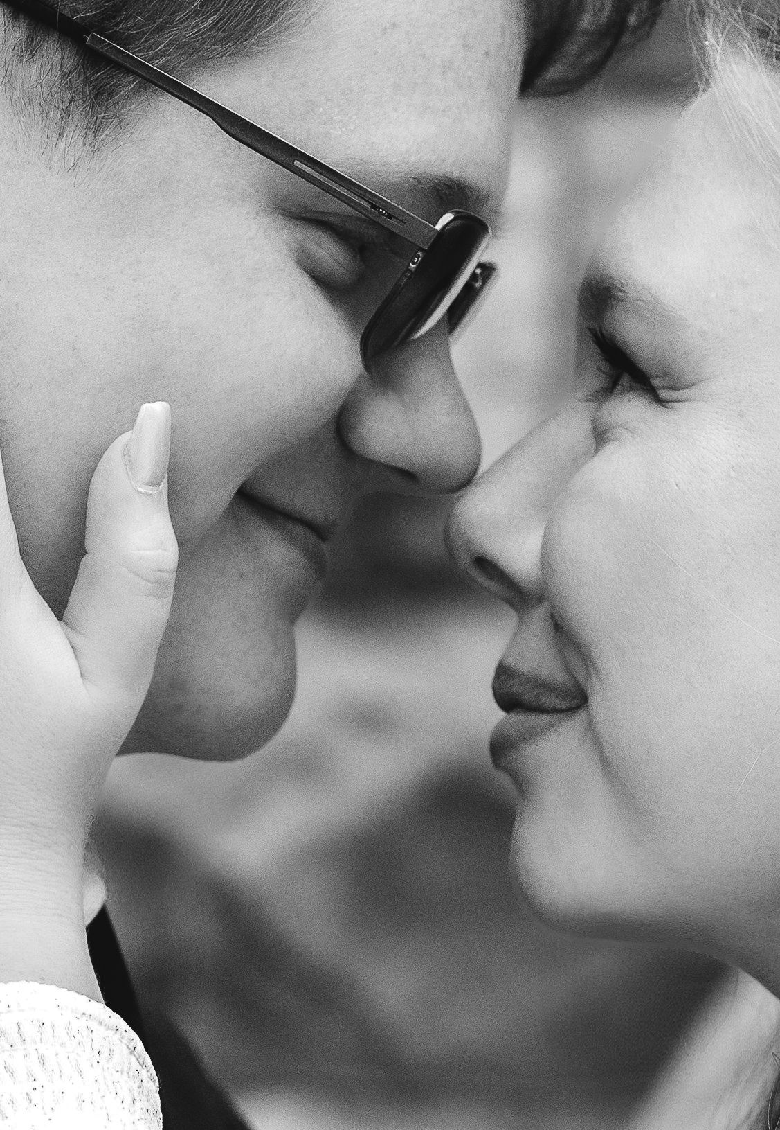 documentary-style wedding photographer captures intimate, urban enagagement photos at historic jasper county courthouse Carthage, Missouri