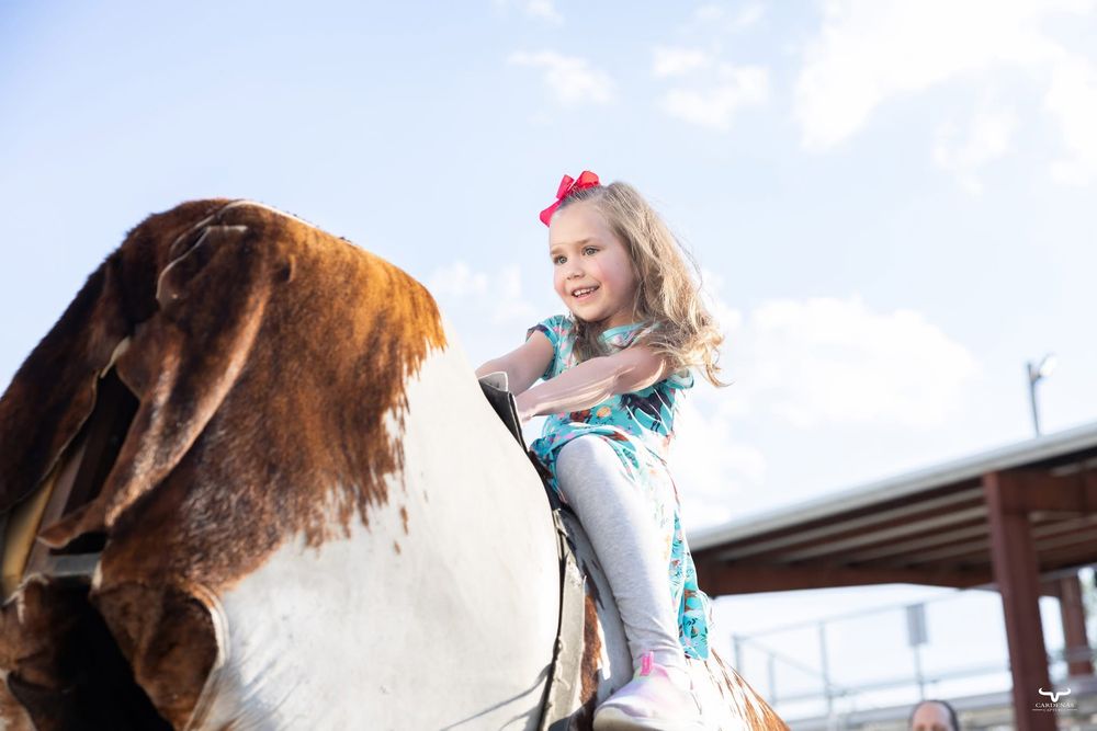 Horse and rider performing at an outdoor equestrian event. Nebraska Pro Rodeo PRCA Rodeo Photographer Dakota Cardenas