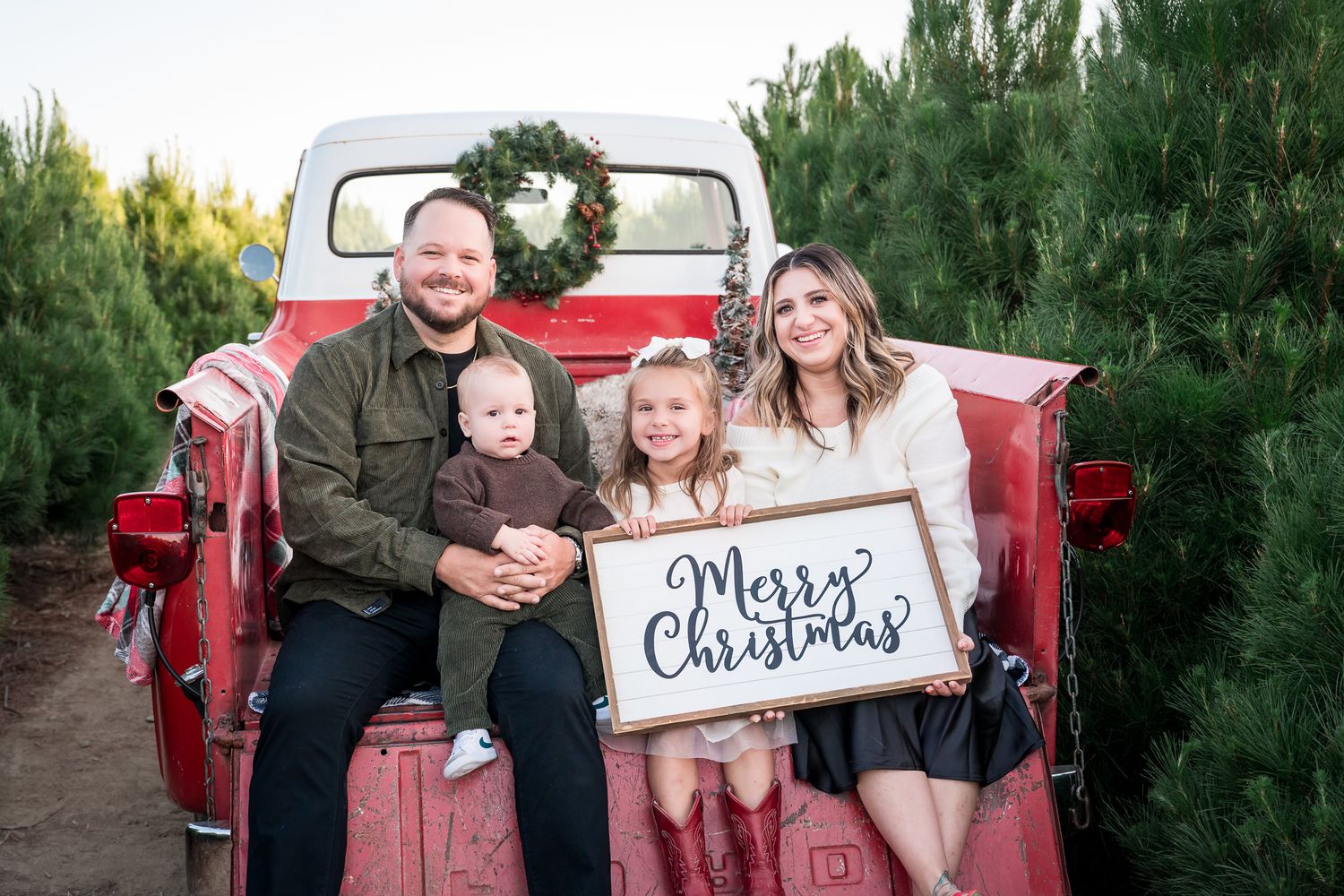 Holiday Family Photoshoots with a Vintage Red Pickup Truck at a Christmas Tree Farm in Orange County, CA