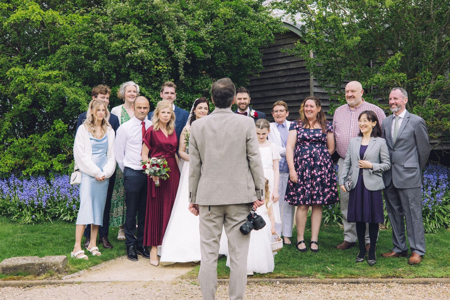 Aaron Cole Wedding Photographer, organises a group for their family portrait