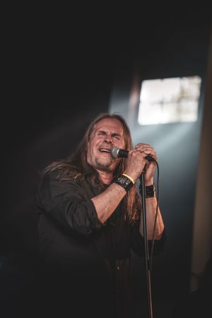 Live concert photography capturing dynamic moments for event managers and rock bands. Ideal for promotions, branding, and tour marketing.