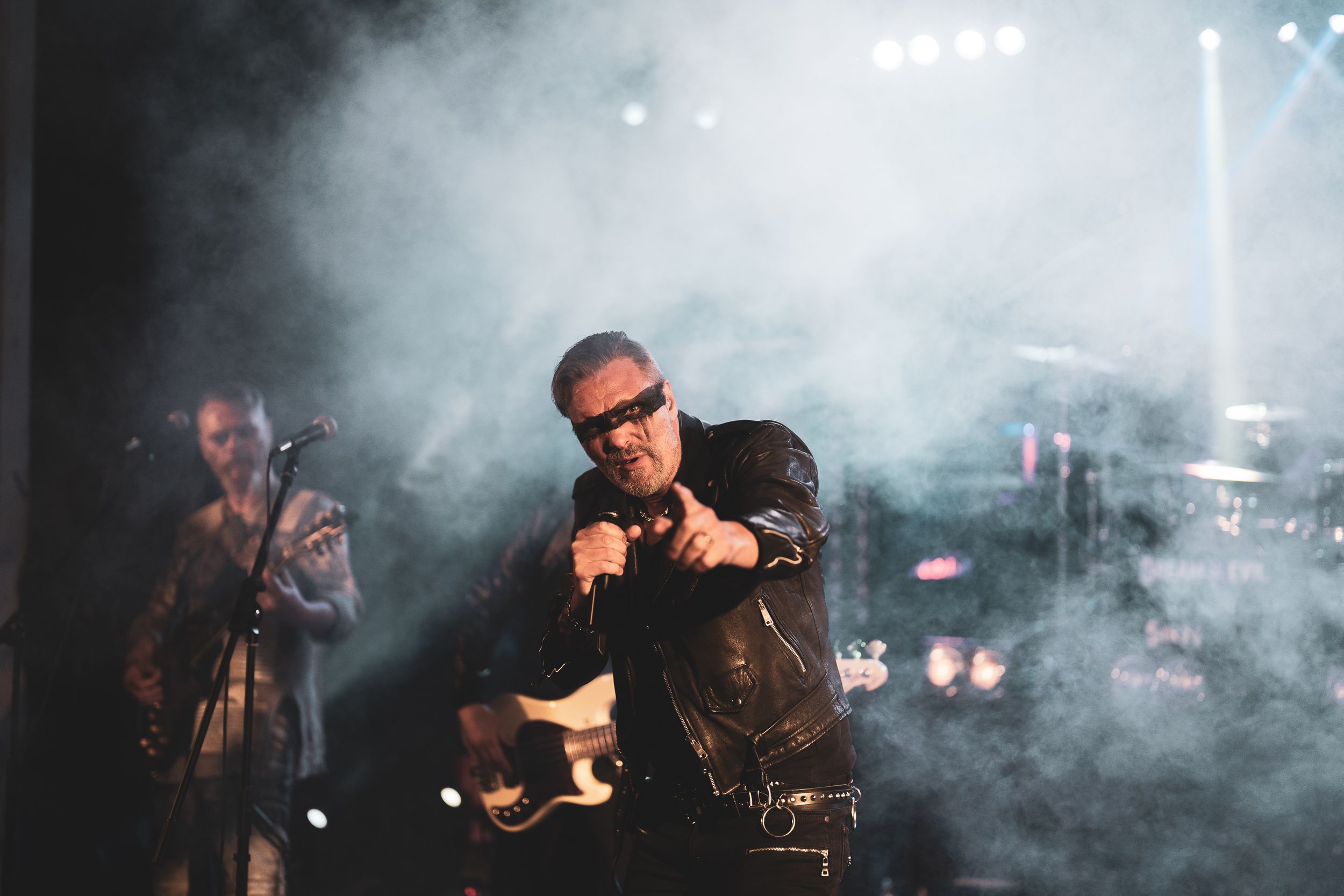 Live musician performing outdoors, captured in dynamic natural lighting. Perfect for event promotion, festival branding, and artist portfoli