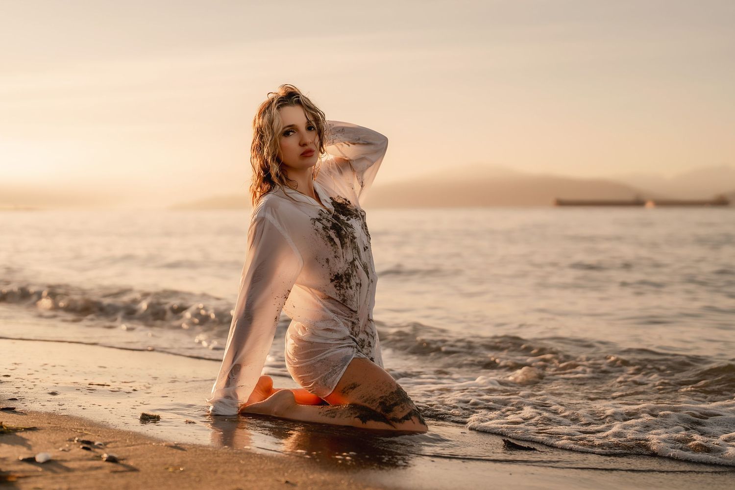 Feminine boudoir photography Vancouver soft natural light and neutral tones at the beach on the sand
