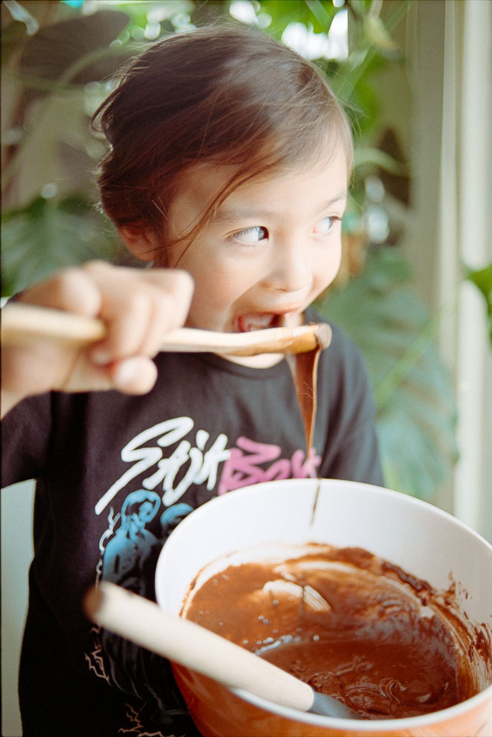 A series of photos showing someone drinking from a bowl of chocolate or soup while sitting near a window with greenery outside.