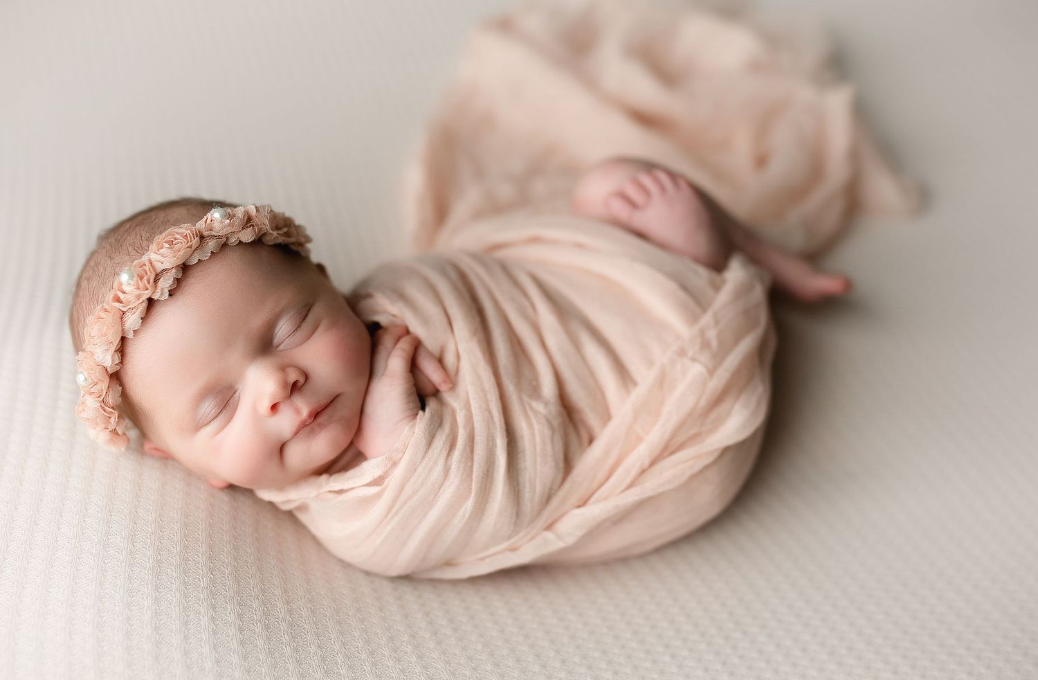 A baby girl in a peach wrap. Greenville sc newborn photographer, Easley sc newborn photographer, Upstate sc newborn photographer