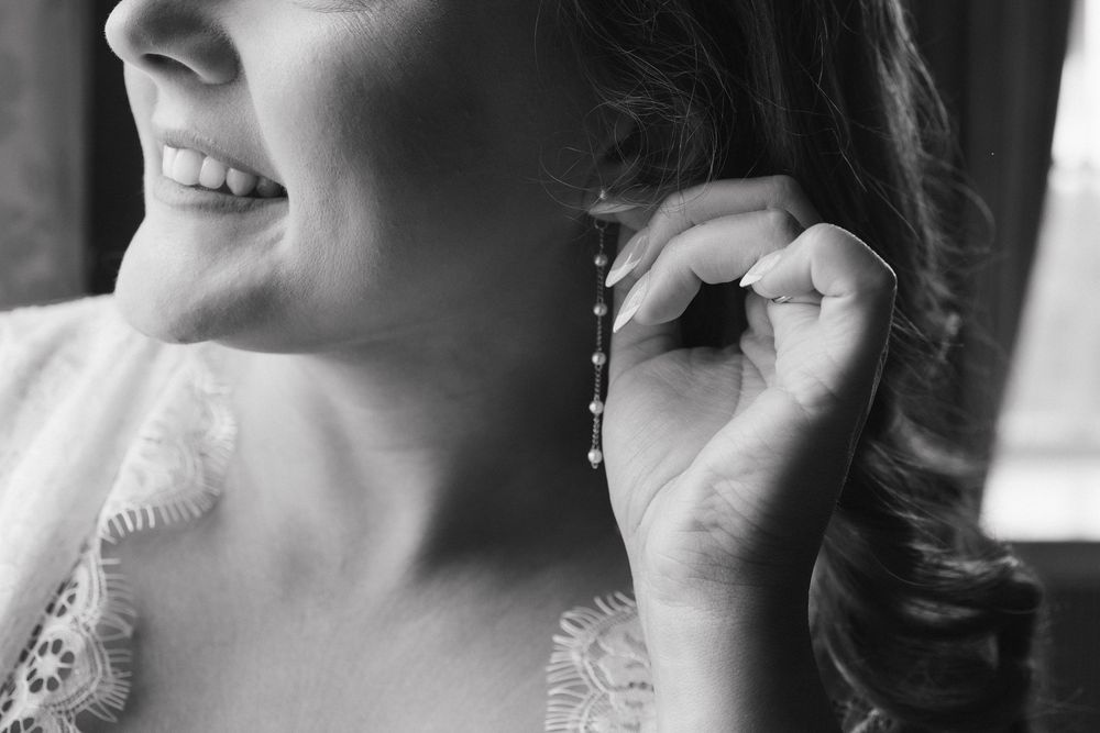 Close-up shots of joyful expressions and tender moments during a wedding celebration.