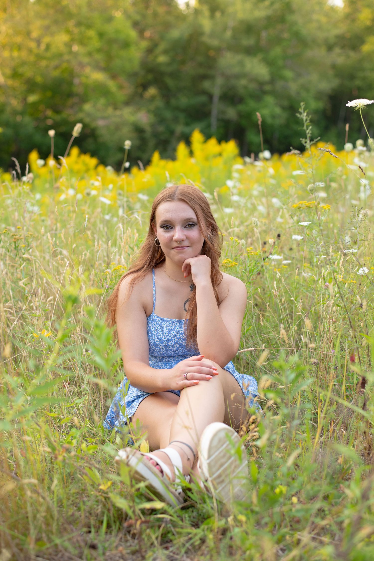 A series of photos in a wildflower meadow with yellow blooms and tall grass on a sunny summer day.