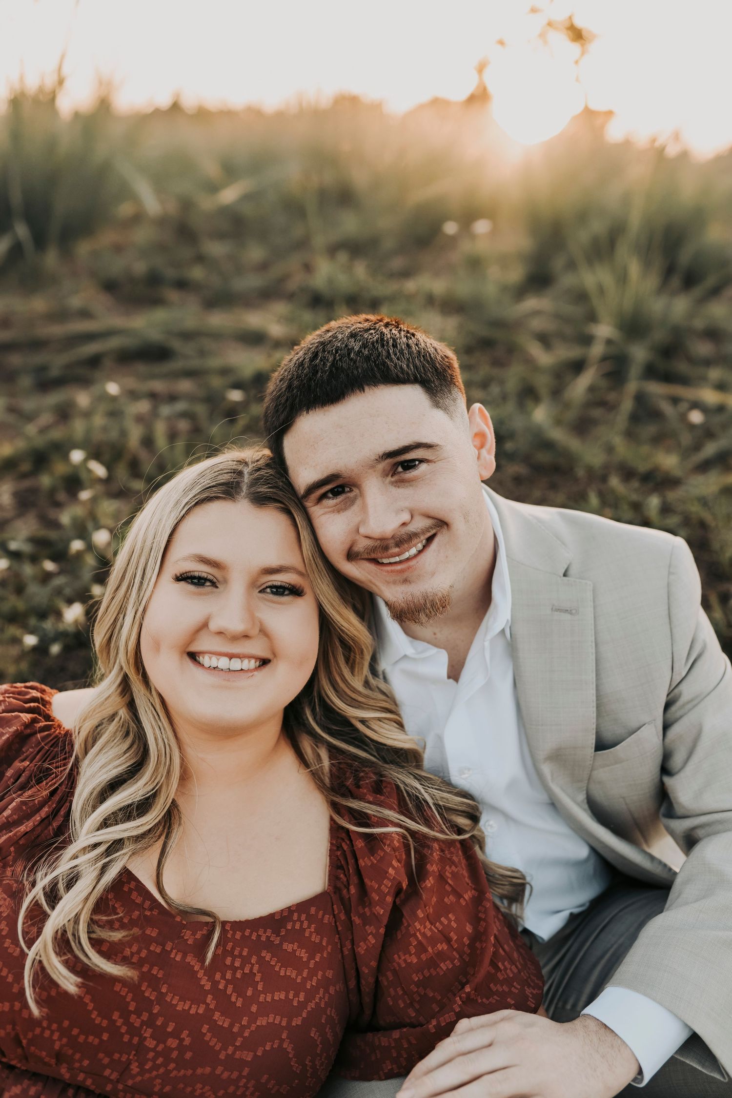 Romantic engagement photos in Flower Mound Texas field at sunset.