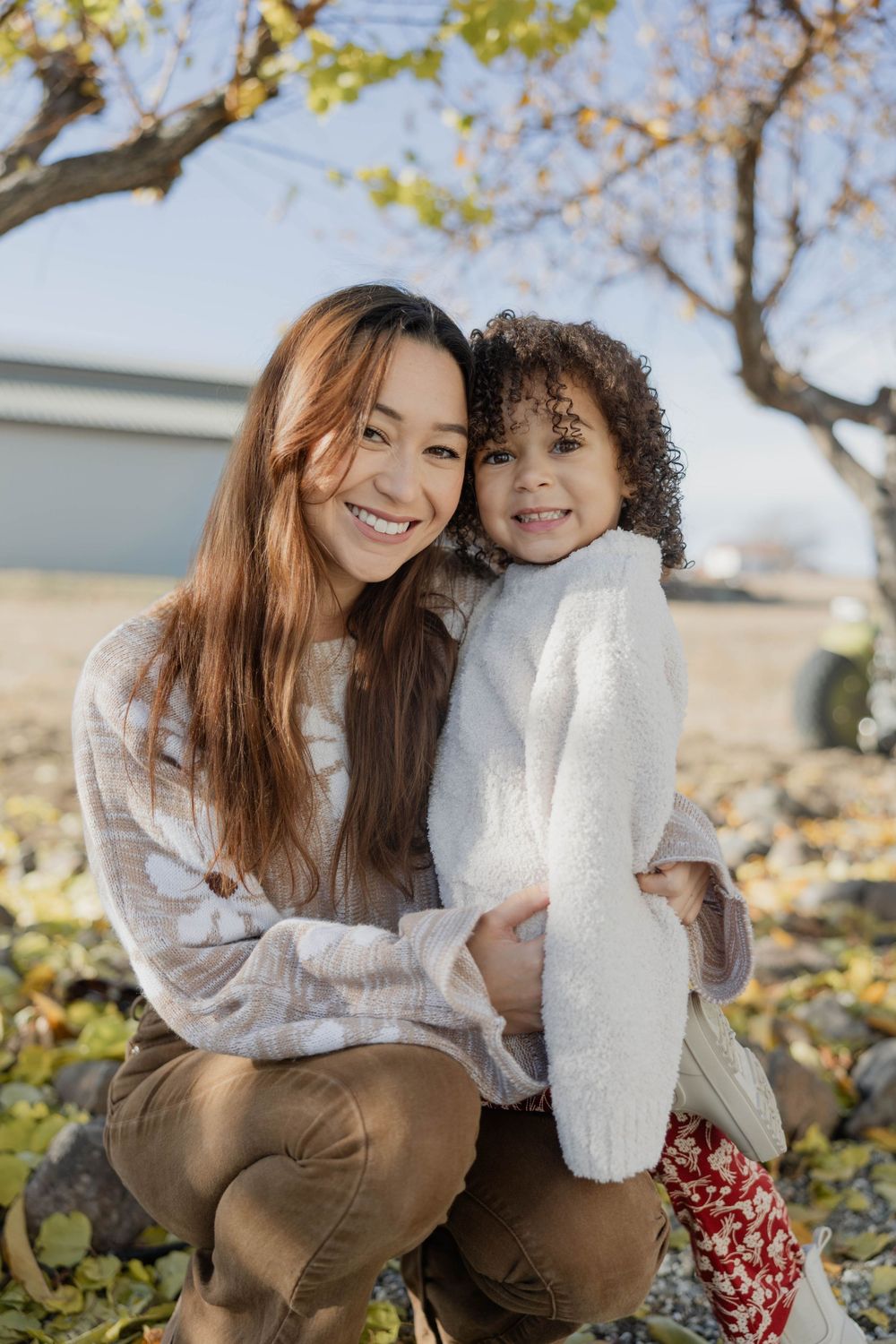 Candid outdoor portraits with warm autumn colors and natural lighting.
