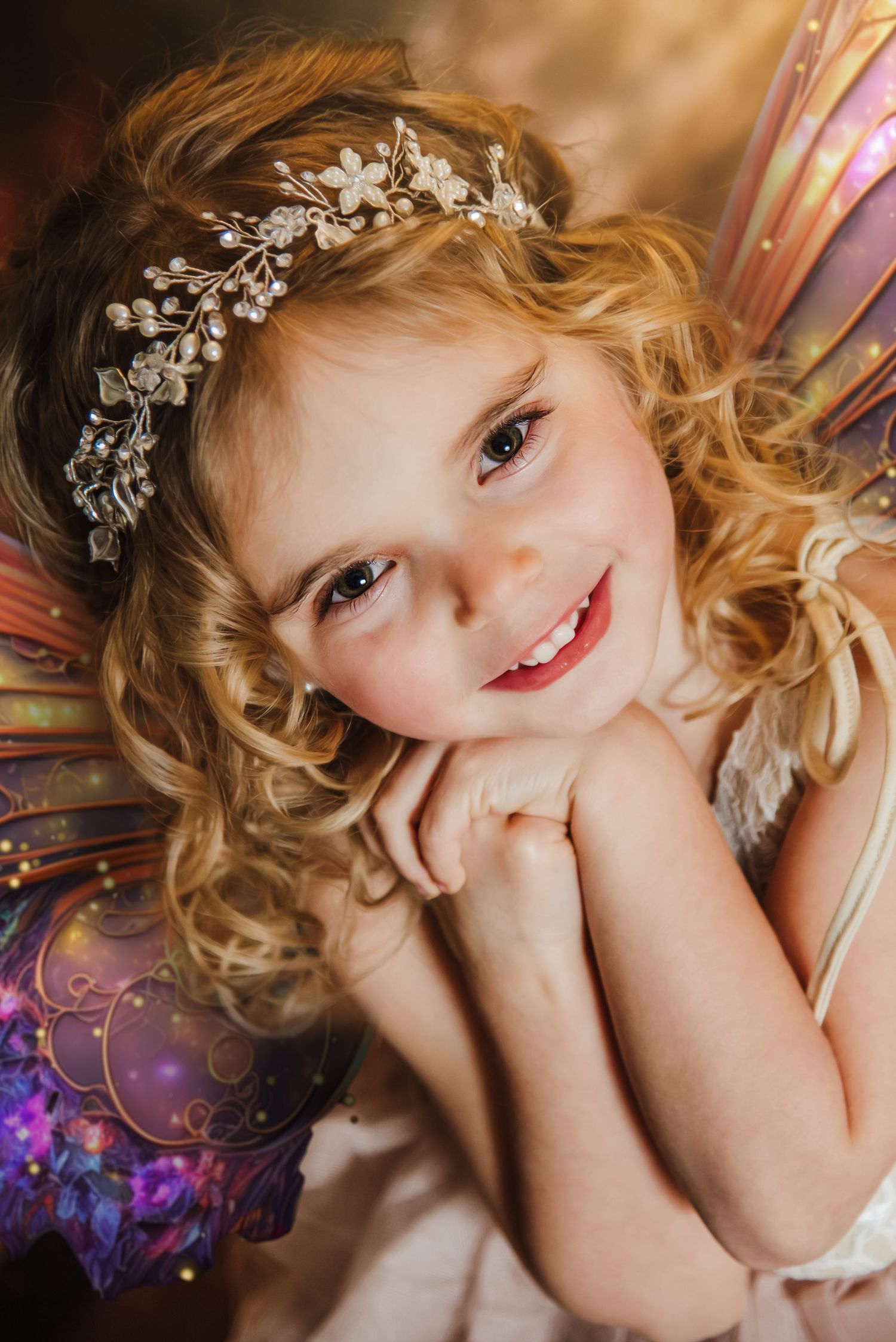 Artistic portrait series showing delicate expressions and soft curls adorned with floral hairpieces against colorful backgrounds.