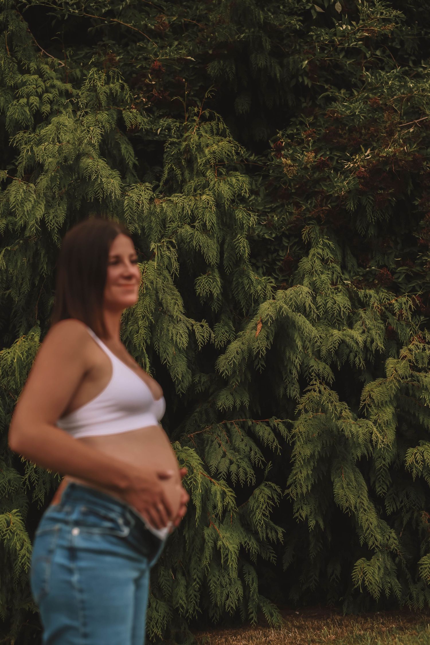 A series of candid outdoor portraits against green foliage showing movement and natural expressions.