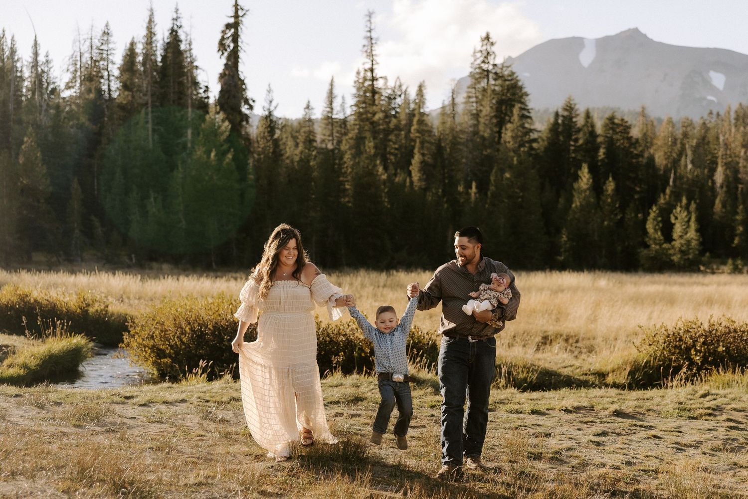 A series of mountain landscape photos showing people walking through scenic wilderness areas at sunset.