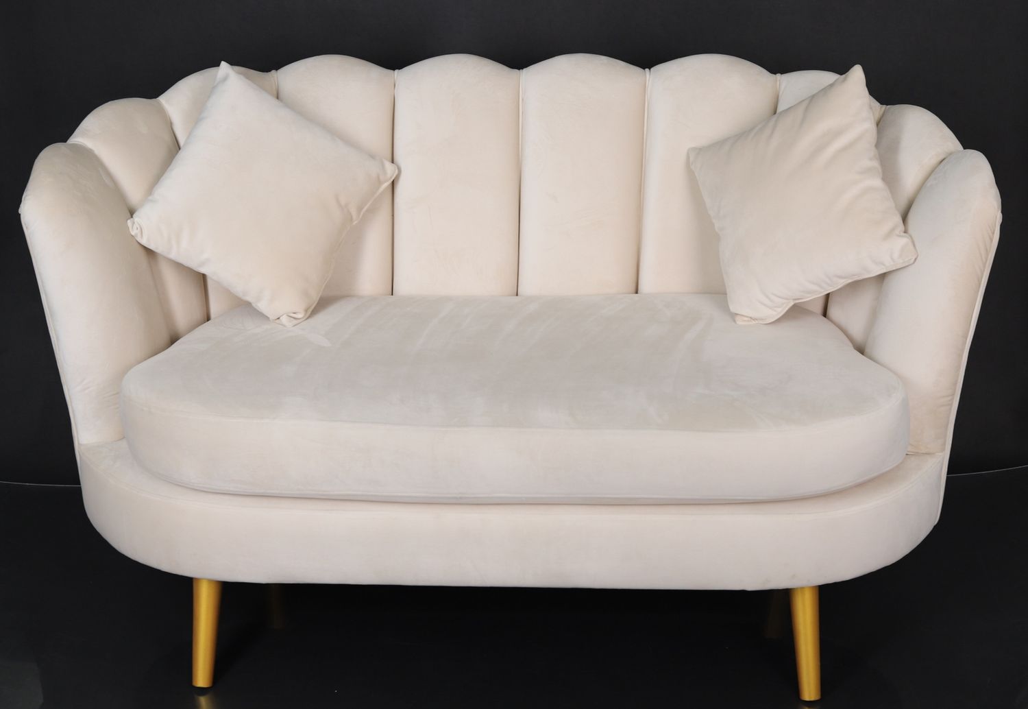 White modern loveseat sofa with curved back and gold metal legs shown from multiple angles on black background.