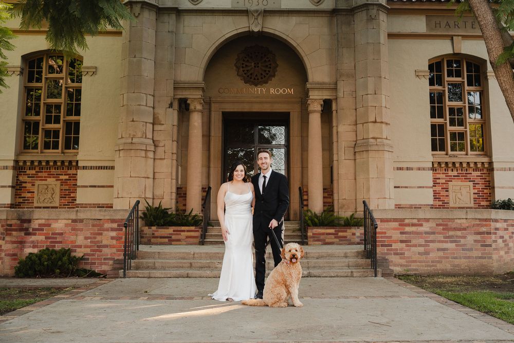 Pasadena wedding photographer capturing a couple with their dog in soft afternoon light
