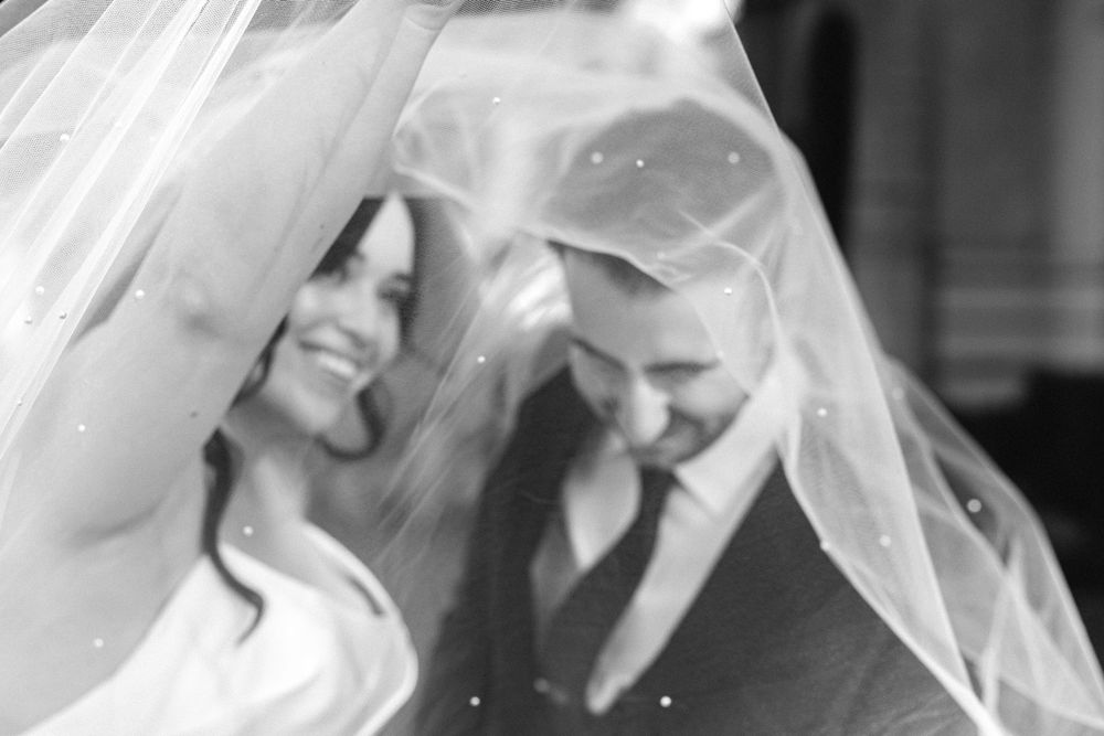 Couple entering their wedding venue in Pasadena captured by a Los Angeles wedding photographer