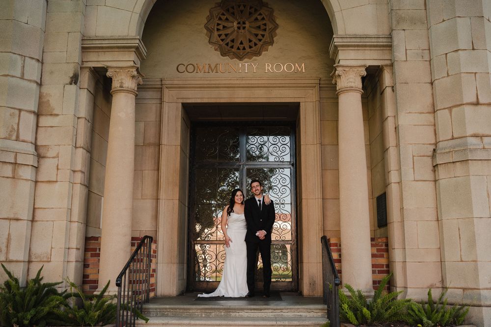Bride and groom holding hands at their Pasadena wedding