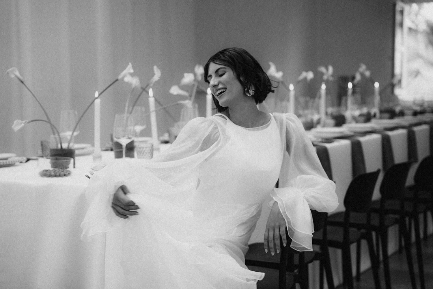 Series of black and white photos capturing movement and dance in an indoor setting.