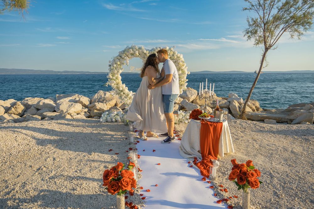 Split Beach Proposal flower heart arch with picnic and photosession