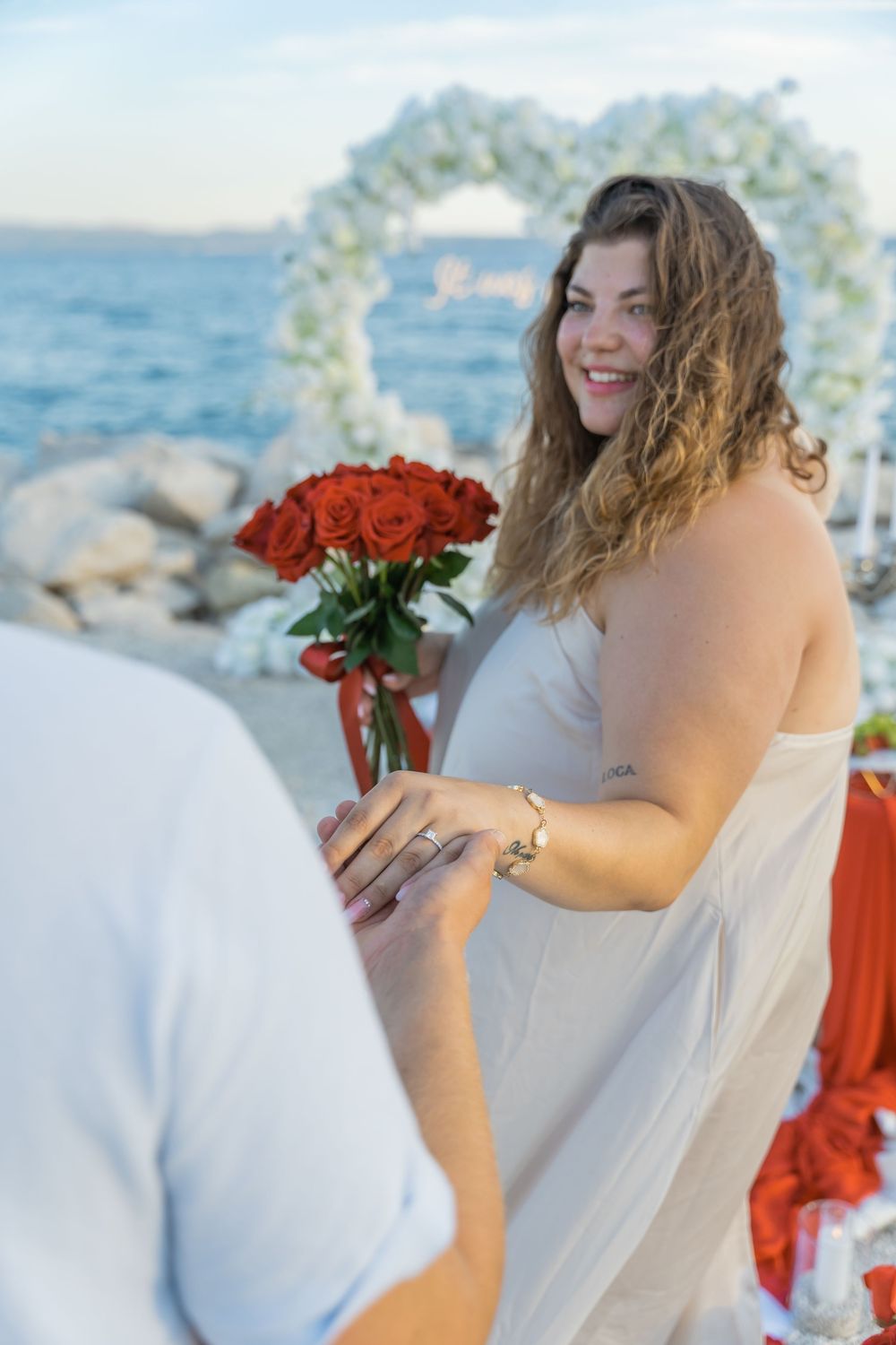 Split Beach Proposal flower heart arch with picnic and photosession