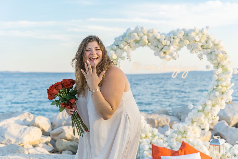 Split Beach Proposal flower heart arch with picnic and photosession