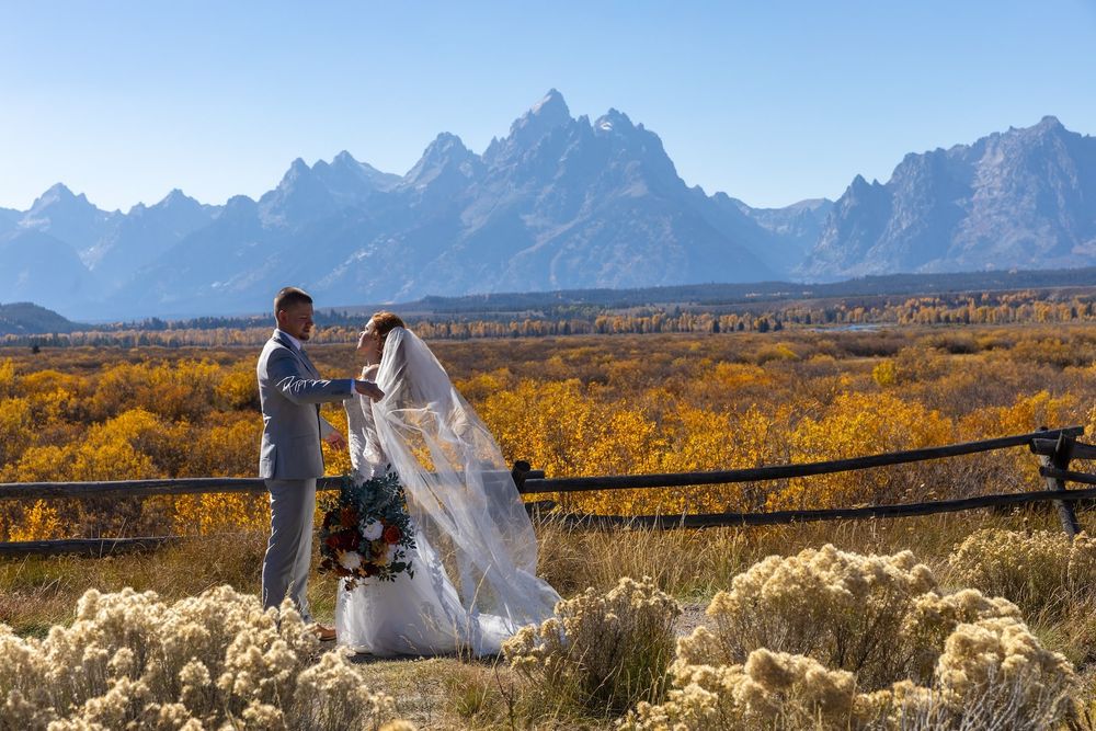 A bridal portrait session in front of the majestic Teton mountain range during autumn.
