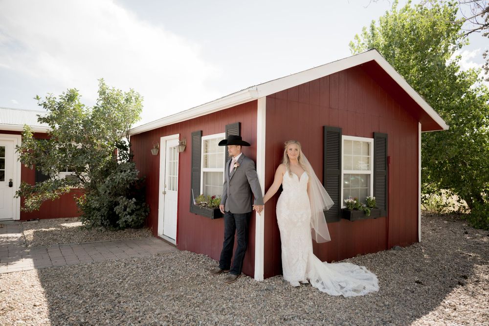 A series of exterior shots showing a rustic red ranch-style house with white trim against a natural landscape.
