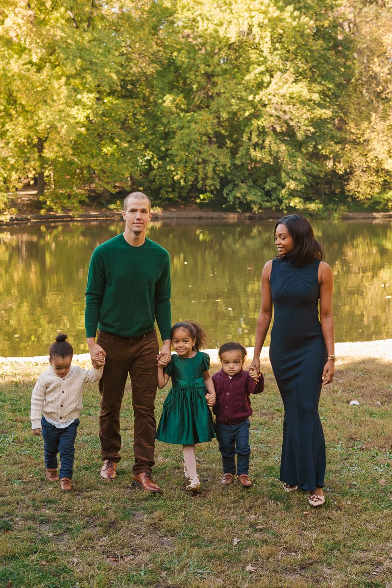 Mother laughing with children near the Prospect Park tunnel during a family session