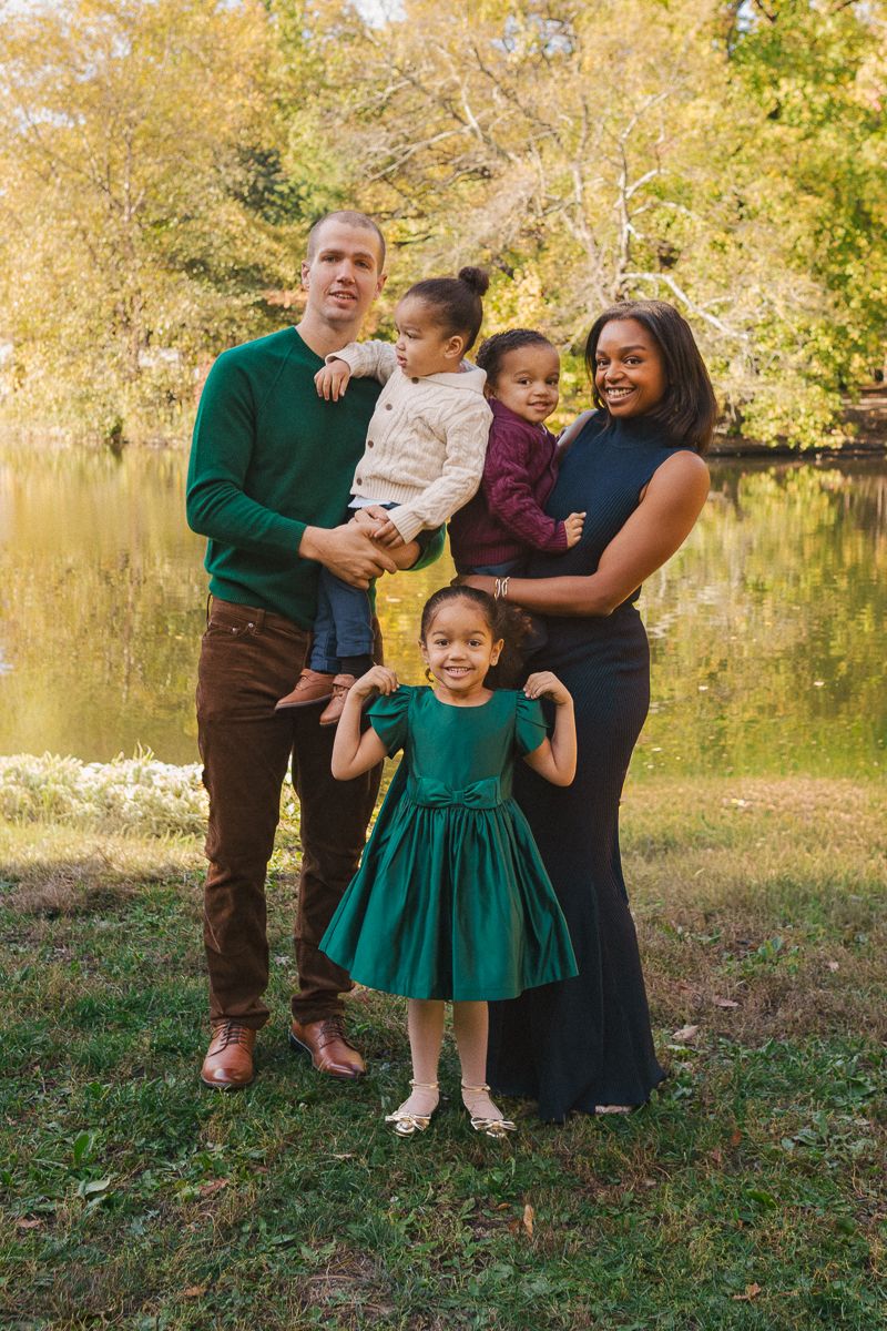 Editorial-style Brooklyn family photos with children running through park greenery