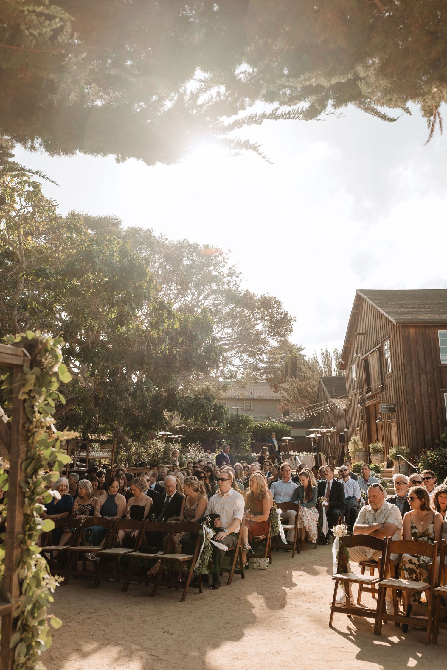 wedding ceremony at the barns at cooper molera - monterey wedding photographer