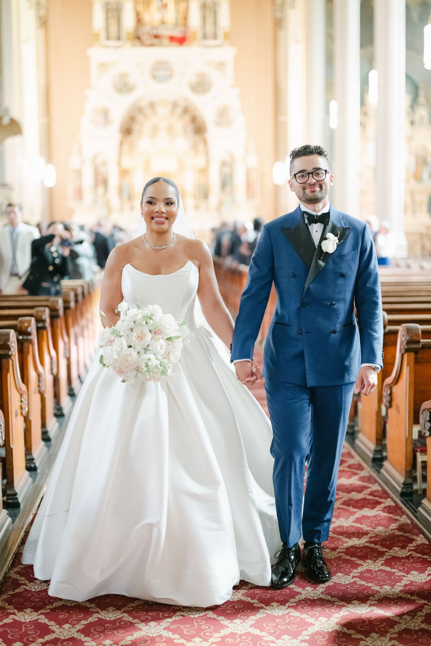 A series of wedding photos showing a couple walking down a church aisle with ornate red carpet and wooden pews.