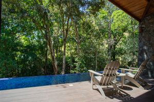 Beautiful tropical garden with exotic plants and flowers in a gated community in Atenas. A natural paradise