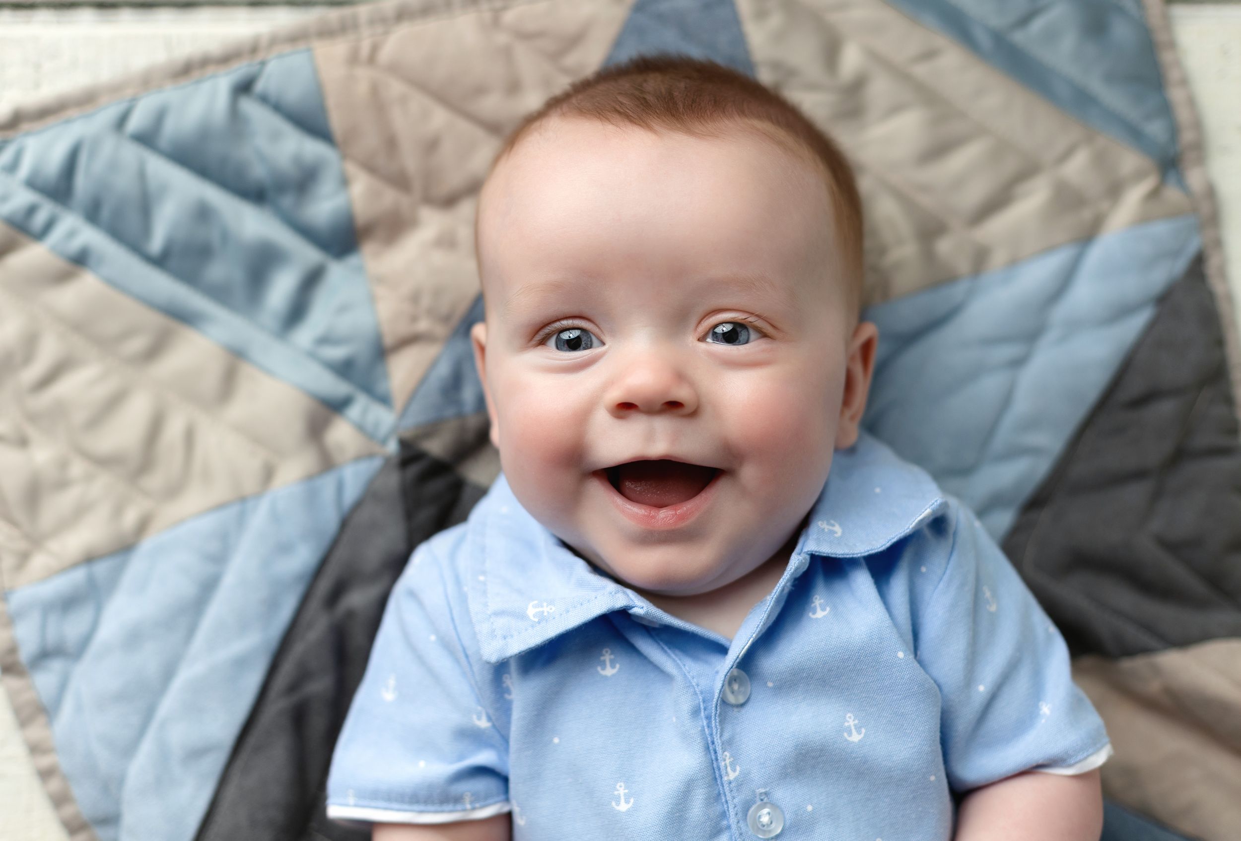 One year old on plaid blanket. Greenville SC newborn photographer, Easley SC newborn photographer