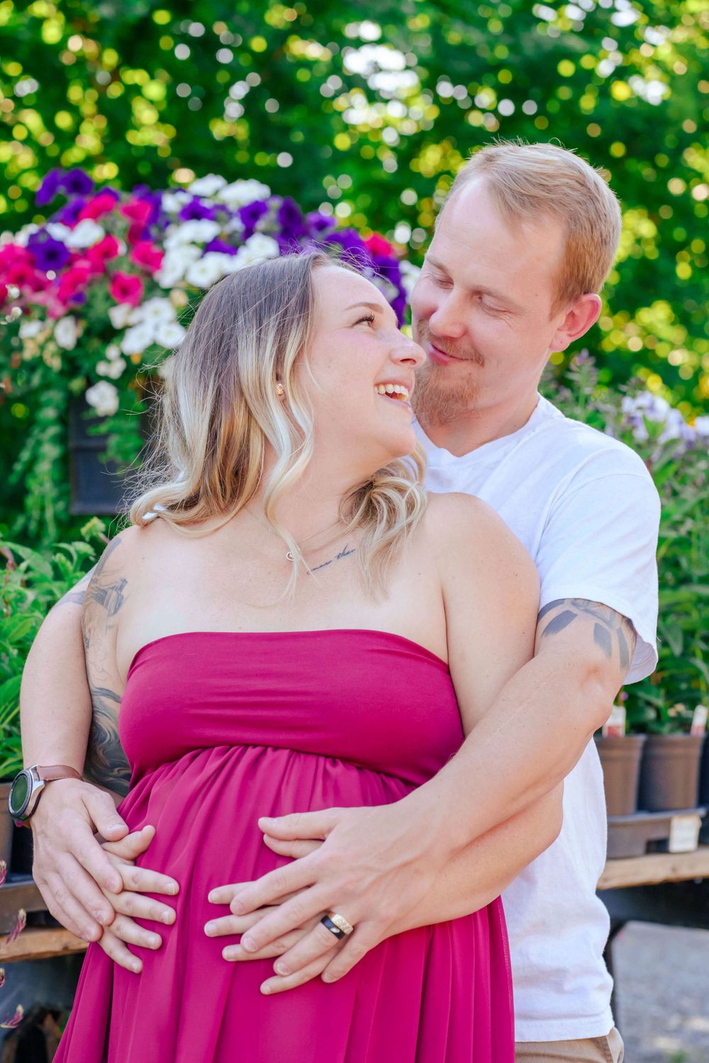 dad and mom sharing a moment before daughter is born