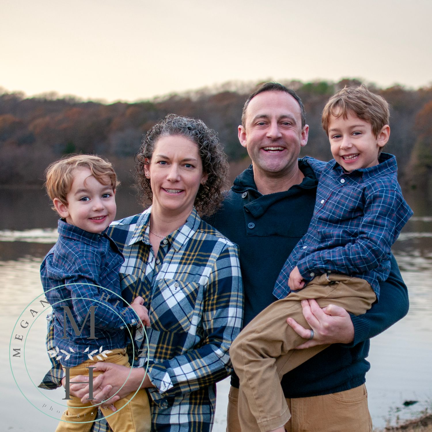 Family of 4 with 2 young boys image photo
