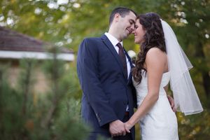 A series of romantic wedding photos showing a couple sharing kisses outdoors with natural greenery in the background.