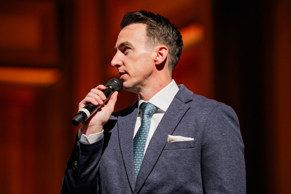 Man singing into a microphone