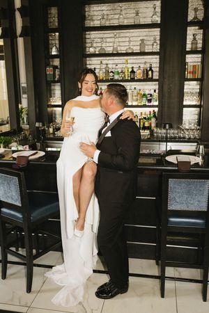 bride and groom wedding bar flash photography