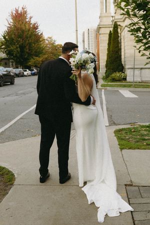 couple wedding kissing
