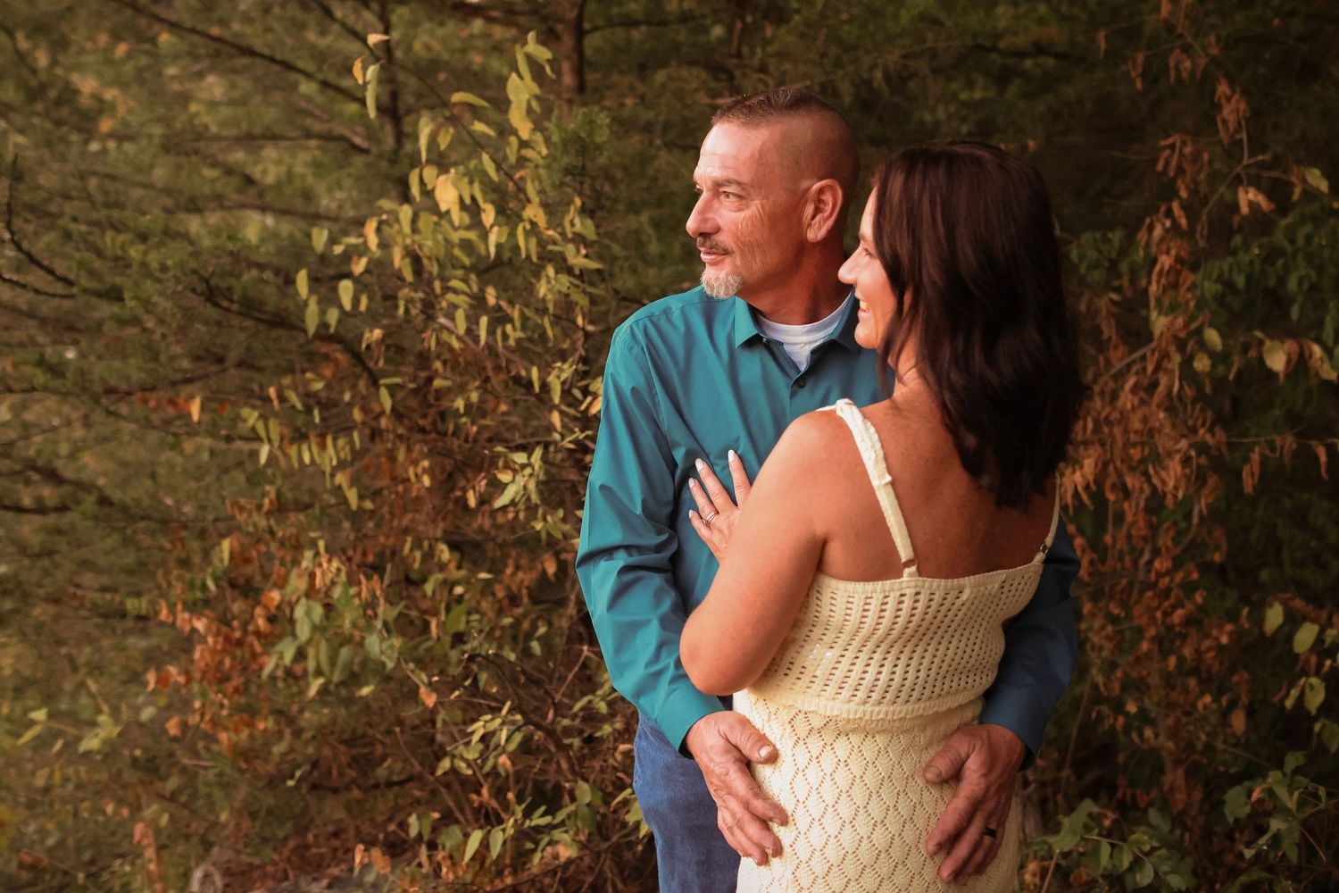 Kelly and Daron together in the woods—authentic couples photography Springfield MO.