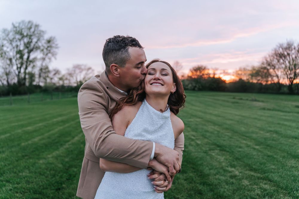 Romantic couple shares tender moments in a green field during sunset as captured in a series of intimate photographs.