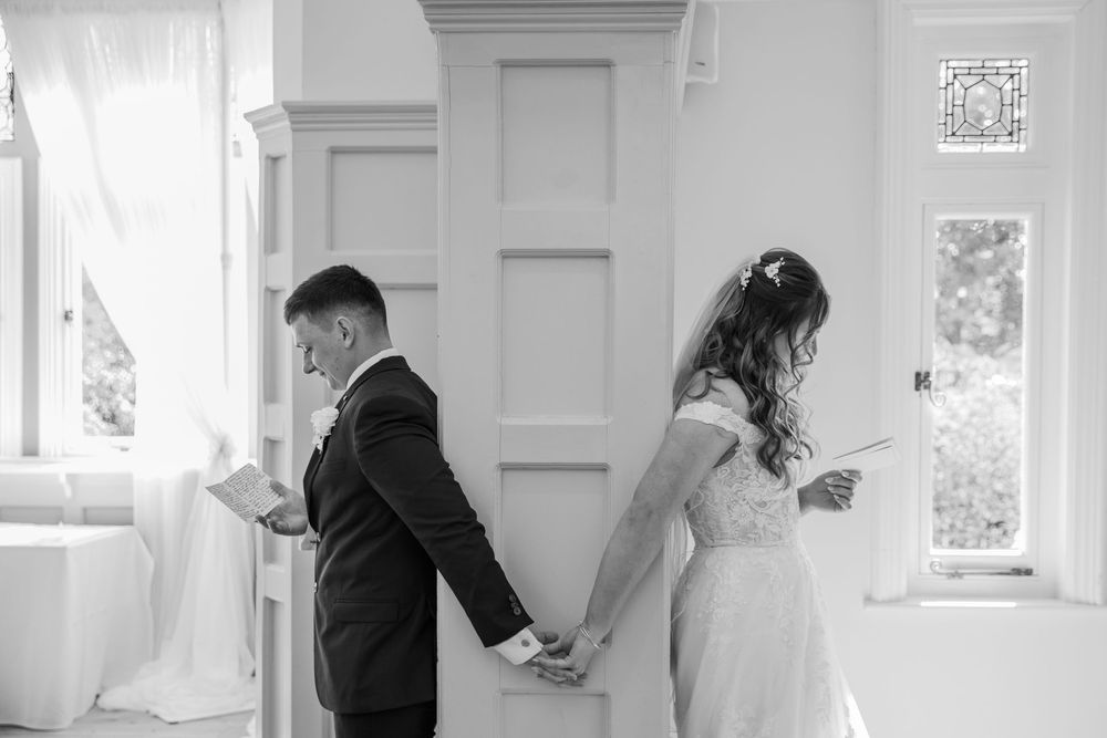 A series of black and white wedding photos showing intimate moments between couples in elegant indoor settings.