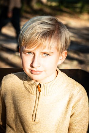 Portrait series in warm lighting showing subtle changes in expression.