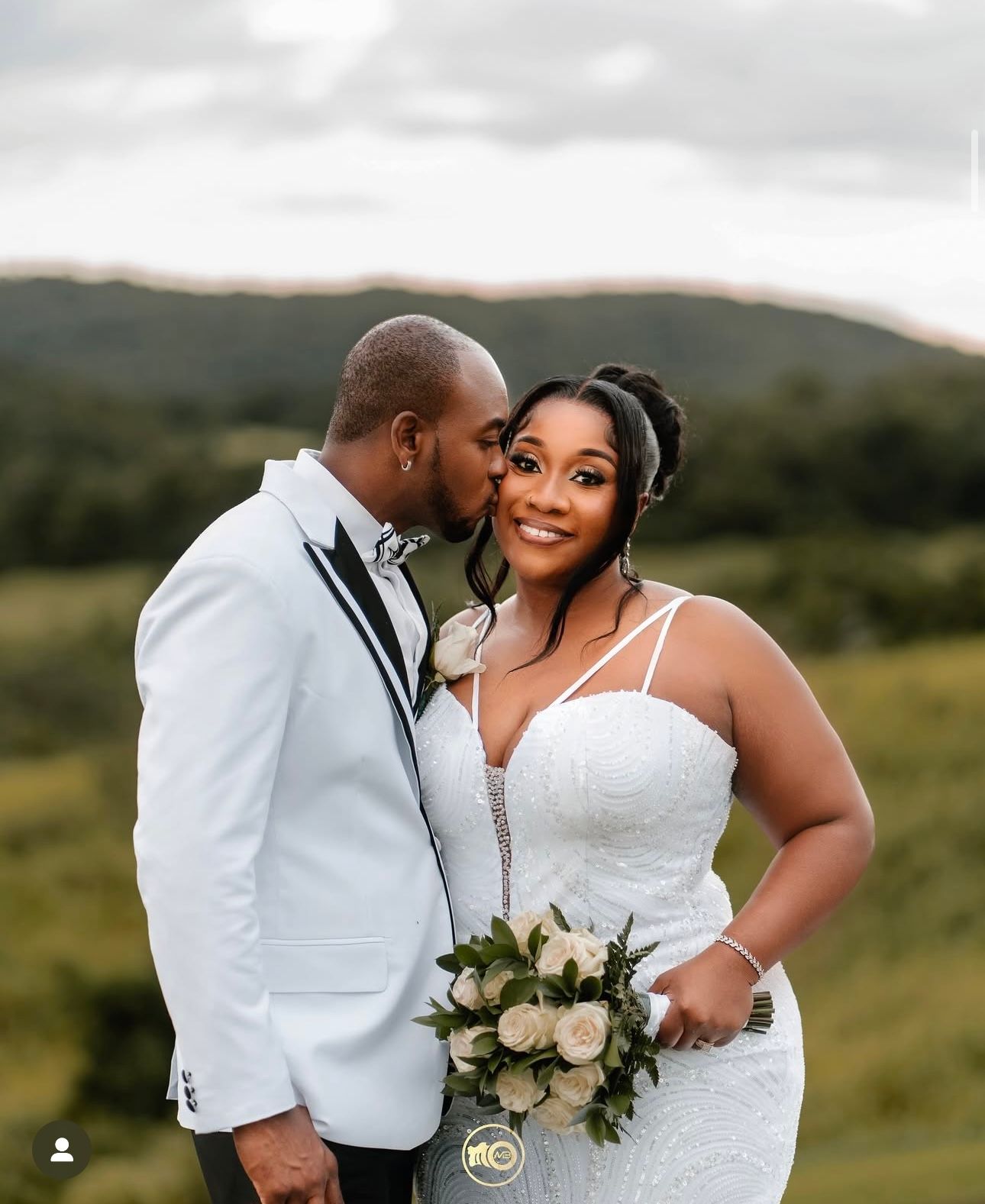 Elegant outdoor wedding portraits against rolling hills at sunset.