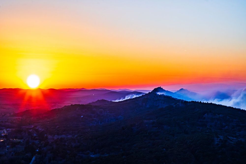 Sunset over prescribed burn at Rattlesnake Ridge, AR