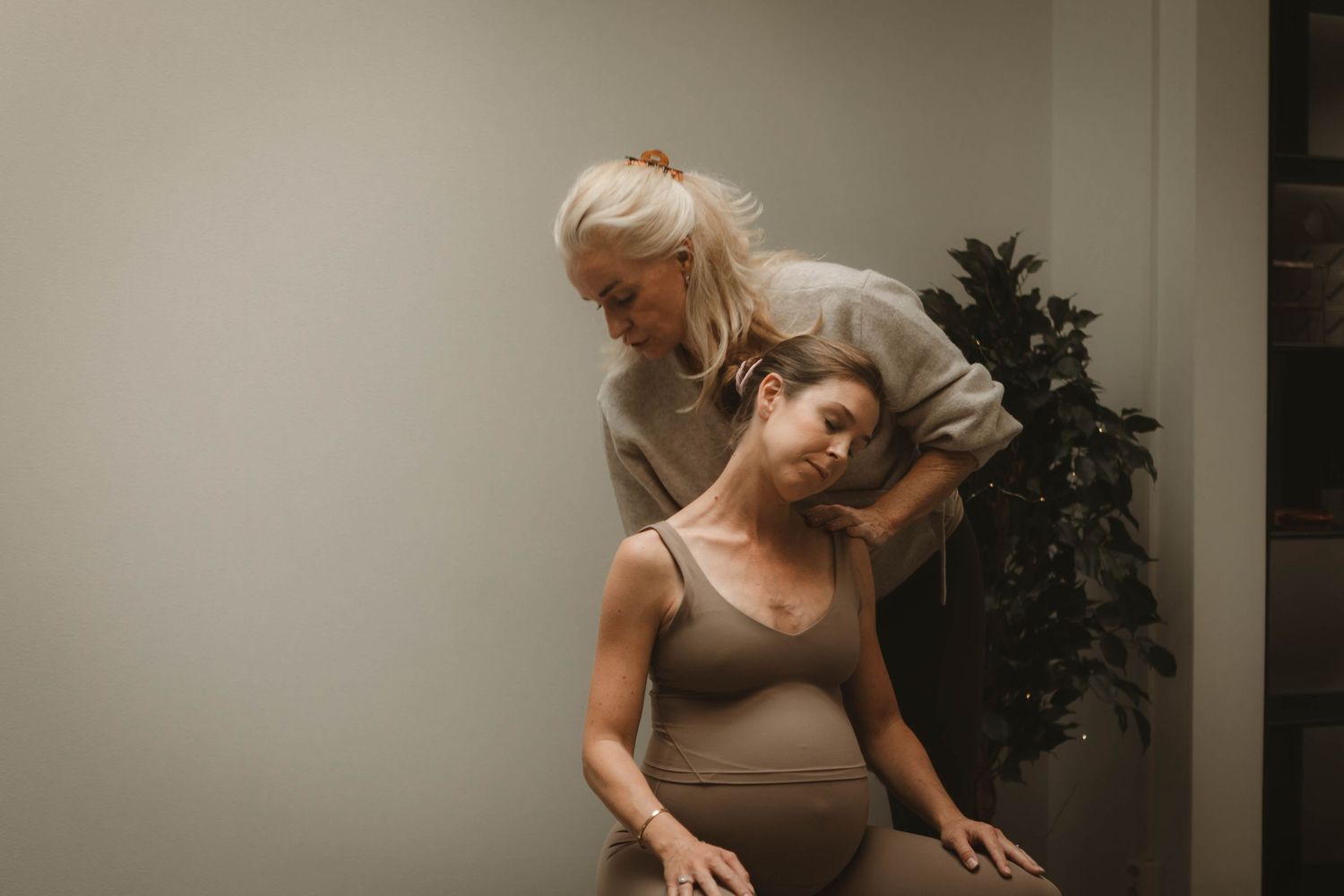 A tender massage therapy session in a serene indoor setting.